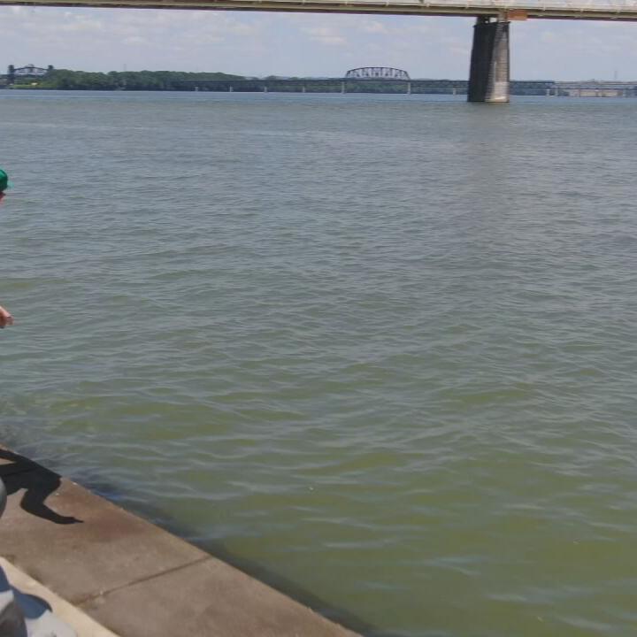 Stone Skipping Champ Jon Jennings practices on Ohio River in Louisville